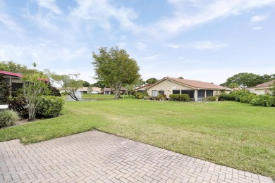 Welcome home to 5695 Lakeview Mews Drive in the heart of Boynton on Indian Spring Golf and Country Club in Florida - for sale on GolfHomes.com, golf home, golf lot