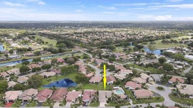 Welcome home to 5695 Lakeview Mews Drive in the heart of Boynton on Indian Spring Golf and Country Club in Florida - for sale on GolfHomes.com, golf home, golf lot