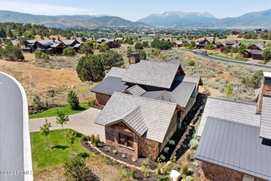 This exquisite single-story Club Cabin offers a harmonious blend on Red Ledges Golf Club in Utah - for sale on GolfHomes.com, golf home, golf lot