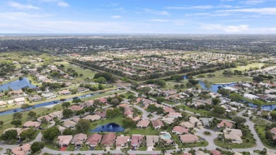Welcome home to 5695 Lakeview Mews Drive in the heart of Boynton on Indian Spring Golf and Country Club in Florida - for sale on GolfHomes.com, golf home, golf lot