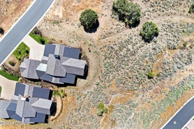 This exquisite single-story Club Cabin offers a harmonious blend on Red Ledges Golf Club in Utah - for sale on GolfHomes.com, golf home, golf lot