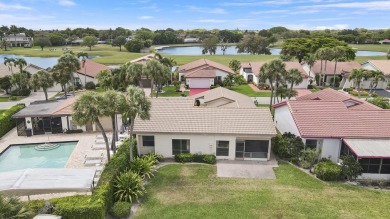 Welcome home to 5695 Lakeview Mews Drive in the heart of Boynton on Indian Spring Golf and Country Club in Florida - for sale on GolfHomes.com, golf home, golf lot