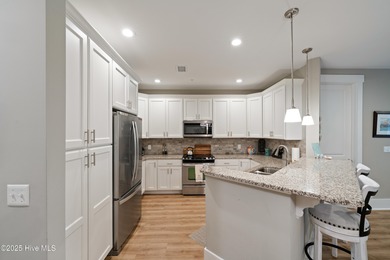 Enjoy this unfurnished luxury condo with 9' ceilings, granite on Members Club At St. James Plantation in North Carolina - for sale on GolfHomes.com, golf home, golf lot