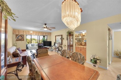 Top floor, corner unit featuring stunning views of the Golf on Boca Dunes Golf and Country Club in Florida - for sale on GolfHomes.com, golf home, golf lot
