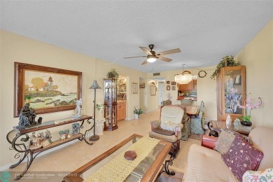 Top floor, corner unit featuring stunning views of the Golf on Boca Dunes Golf and Country Club in Florida - for sale on GolfHomes.com, golf home, golf lot