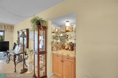 Top floor, corner unit featuring stunning views of the Golf on Boca Dunes Golf and Country Club in Florida - for sale on GolfHomes.com, golf home, golf lot
