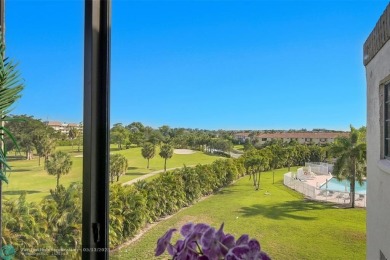 Top floor, corner unit featuring stunning views of the Golf on Boca Dunes Golf and Country Club in Florida - for sale on GolfHomes.com, golf home, golf lot