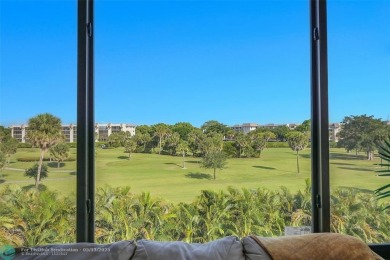 Top floor, corner unit featuring stunning views of the Golf on Boca Dunes Golf and Country Club in Florida - for sale on GolfHomes.com, golf home, golf lot