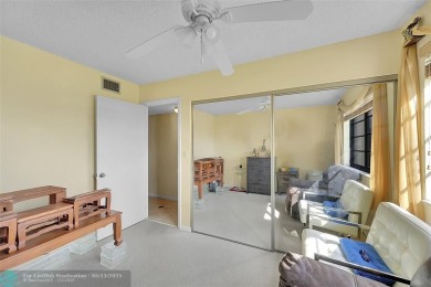 Top floor, corner unit featuring stunning views of the Golf on Boca Dunes Golf and Country Club in Florida - for sale on GolfHomes.com, golf home, golf lot