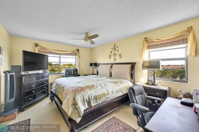 Top floor, corner unit featuring stunning views of the Golf on Boca Dunes Golf and Country Club in Florida - for sale on GolfHomes.com, golf home, golf lot