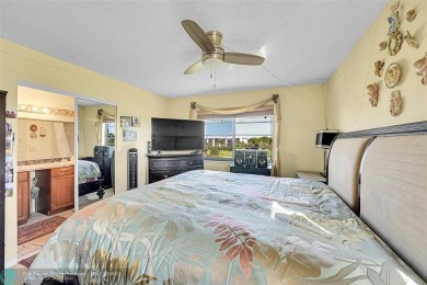 Top floor, corner unit featuring stunning views of the Golf on Boca Dunes Golf and Country Club in Florida - for sale on GolfHomes.com, golf home, golf lot