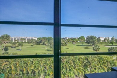 Top floor, corner unit featuring stunning views of the Golf on Boca Dunes Golf and Country Club in Florida - for sale on GolfHomes.com, golf home, golf lot