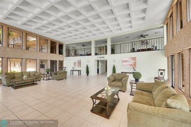 Top floor, corner unit featuring stunning views of the Golf on Boca Dunes Golf and Country Club in Florida - for sale on GolfHomes.com, golf home, golf lot