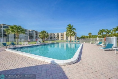 Top floor, corner unit featuring stunning views of the Golf on Boca Dunes Golf and Country Club in Florida - for sale on GolfHomes.com, golf home, golf lot