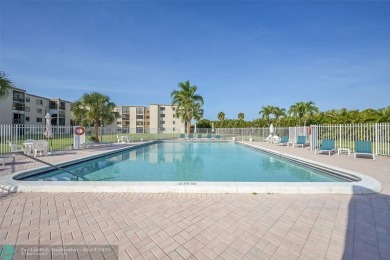 Top floor, corner unit featuring stunning views of the Golf on Boca Dunes Golf and Country Club in Florida - for sale on GolfHomes.com, golf home, golf lot