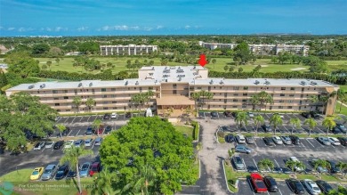 Top floor, corner unit featuring stunning views of the Golf on Boca Dunes Golf and Country Club in Florida - for sale on GolfHomes.com, golf home, golf lot