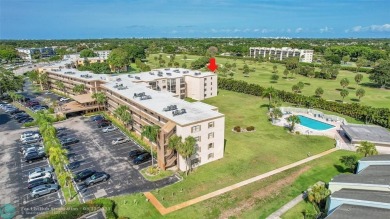 Top floor, corner unit featuring stunning views of the Golf on Boca Dunes Golf and Country Club in Florida - for sale on GolfHomes.com, golf home, golf lot