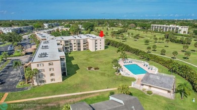 Top floor, corner unit featuring stunning views of the Golf on Boca Dunes Golf and Country Club in Florida - for sale on GolfHomes.com, golf home, golf lot
