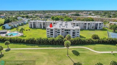 Top floor, corner unit featuring stunning views of the Golf on Boca Dunes Golf and Country Club in Florida - for sale on GolfHomes.com, golf home, golf lot