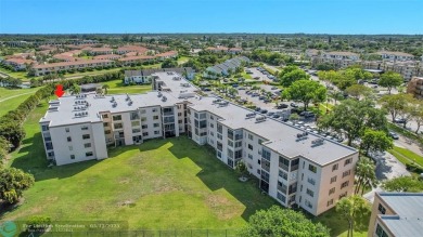Top floor, corner unit featuring stunning views of the Golf on Boca Dunes Golf and Country Club in Florida - for sale on GolfHomes.com, golf home, golf lot