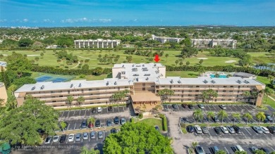 Top floor, corner unit featuring stunning views of the Golf on Boca Dunes Golf and Country Club in Florida - for sale on GolfHomes.com, golf home, golf lot