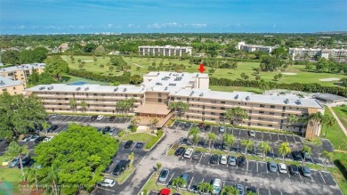 Top floor, corner unit featuring stunning views of the Golf on Boca Dunes Golf and Country Club in Florida - for sale on GolfHomes.com, golf home, golf lot
