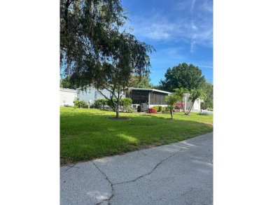 Welcome to Your Spacious Corner Lot Retreat with Bonus Room & on Schalamar Creek Golf and Country Club in Florida - for sale on GolfHomes.com, golf home, golf lot