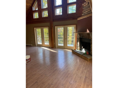 This serene Adirondack Chalet tucked back off the road has been on Malone Golf Club, Inc. in New York - for sale on GolfHomes.com, golf home, golf lot