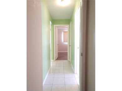 Under contract-accepting backup offers. FRESHLY PAINTED 2/11/25! on Mainlands Golf Club in Florida - for sale on GolfHomes.com, golf home, golf lot