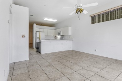 Exceptional opportunity to purchase this well-situated 3 bedroom on Village Golf Club in Florida - for sale on GolfHomes.com, golf home, golf lot
