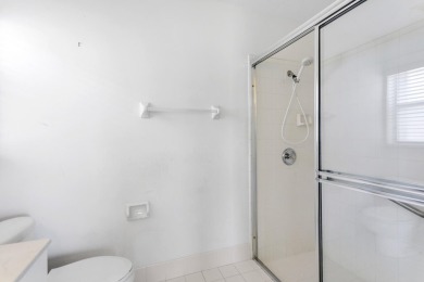 Exceptional opportunity to purchase this well-situated 3 bedroom on Village Golf Club in Florida - for sale on GolfHomes.com, golf home, golf lot