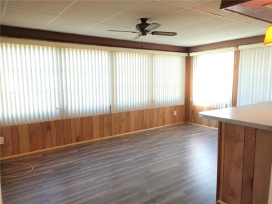 Under contract-accepting backup offers. FRESHLY PAINTED 2/11/25! on Mainlands Golf Club in Florida - for sale on GolfHomes.com, golf home, golf lot