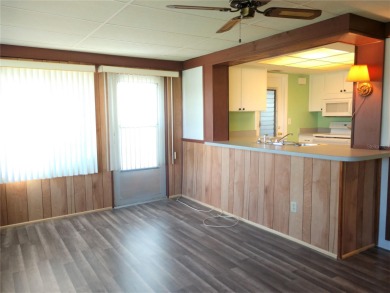 Under contract-accepting backup offers. FRESHLY PAINTED 2/11/25! on Mainlands Golf Club in Florida - for sale on GolfHomes.com, golf home, golf lot