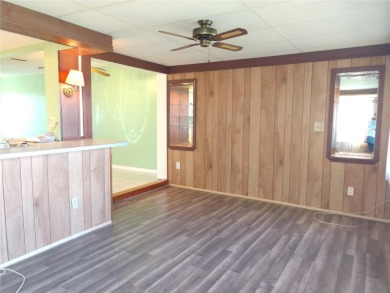 Under contract-accepting backup offers. FRESHLY PAINTED 2/11/25! on Mainlands Golf Club in Florida - for sale on GolfHomes.com, golf home, golf lot