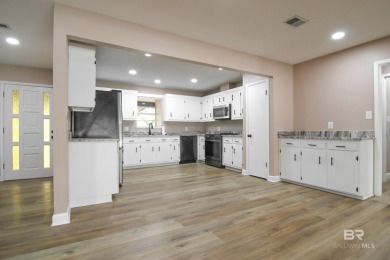 Newly updated Golf Course Home with pool and lanai For Sale! on The Golf Club of the Wharf in Alabama - for sale on GolfHomes.com, golf home, golf lot