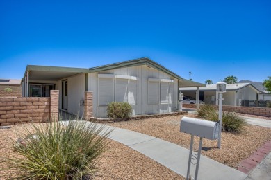 Charming 2-bedroom, 2-bath manufactured home in Palm Desert's on Portola Country Club in California - for sale on GolfHomes.com, golf home, golf lot
