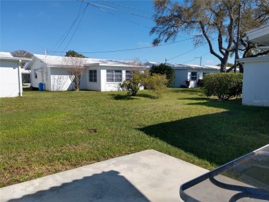 Under contract-accepting backup offers. FRESHLY PAINTED 2/11/25! on Mainlands Golf Club in Florida - for sale on GolfHomes.com, golf home, golf lot