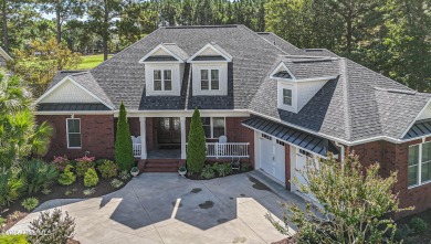 Welcome to this stunning custom-built home in Ocean Ridge on Ocean Ridge Plantation in North Carolina - for sale on GolfHomes.com, golf home, golf lot