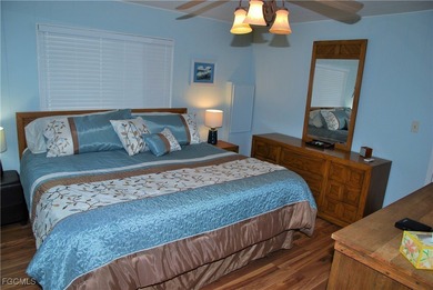 Enjoy stunning golf course views from this beautifully updated on Six Lakes Country Club in Florida - for sale on GolfHomes.com, golf home, golf lot