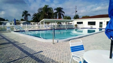 Under contract-accepting backup offers. FRESHLY PAINTED 2/11/25! on Mainlands Golf Club in Florida - for sale on GolfHomes.com, golf home, golf lot