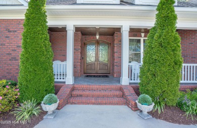 Welcome to this stunning custom-built home in Ocean Ridge on Ocean Ridge Plantation in North Carolina - for sale on GolfHomes.com, golf home, golf lot