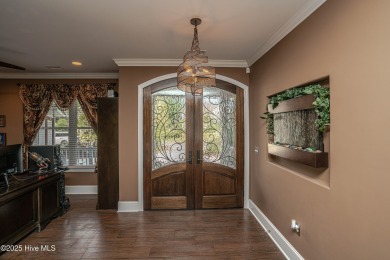 Welcome to this stunning custom-built home in Ocean Ridge on Ocean Ridge Plantation in North Carolina - for sale on GolfHomes.com, golf home, golf lot
