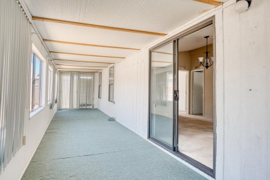 Charming 2-bedroom, 2-bath manufactured home in Palm Desert's on Portola Country Club in California - for sale on GolfHomes.com, golf home, golf lot