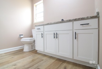 Newly updated Golf Course Home with pool and lanai For Sale! on The Golf Club of the Wharf in Alabama - for sale on GolfHomes.com, golf home, golf lot