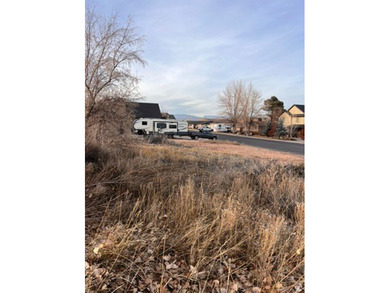 Imagine coming home to wide-open skies, mountain views, and the on Roosevelt Municipal Golf Course in Utah - for sale on GolfHomes.com, golf home, golf lot