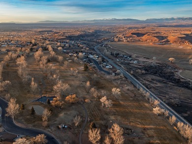 Imagine coming home to wide-open skies, mountain views, and the on Roosevelt Municipal Golf Course in Utah - for sale on GolfHomes.com, golf home, golf lot