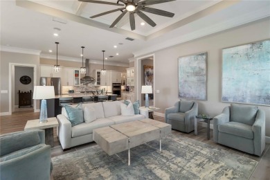 This exceptional Renown model was originally built for a fellow on The Concession Golf Club in Florida - for sale on GolfHomes.com, golf home, golf lot