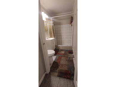 Welcome to this well-located 3-bedroom, 2-bath home in the heart on West Palm Beach Golf Course in Florida - for sale on GolfHomes.com, golf home, golf lot