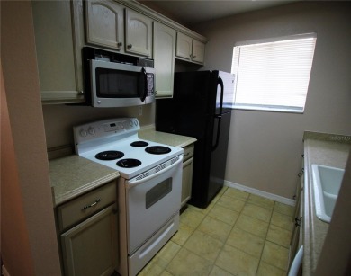 Two Bedroom second floor condo in Eastwood Pines. Only 1 mile on Cove Cay Country Club in Florida - for sale on GolfHomes.com, golf home, golf lot