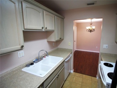 Two Bedroom second floor condo in Eastwood Pines. Only 1 mile on Cove Cay Country Club in Florida - for sale on GolfHomes.com, golf home, golf lot
